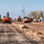 Bild einer Baustelle mit Baufahrzeugen